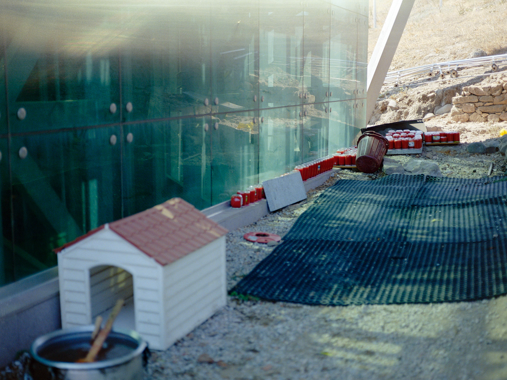 jars of sauce and dog house under the pergamon cable car station